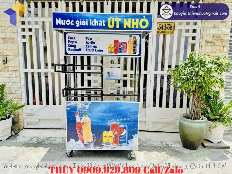 xe bán nước giải khát lưu động lề đường